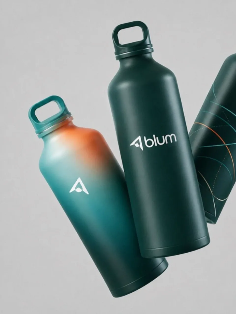 Dos botellas térmicas de Blum, una en degradado naranjo y otra verde petróleo