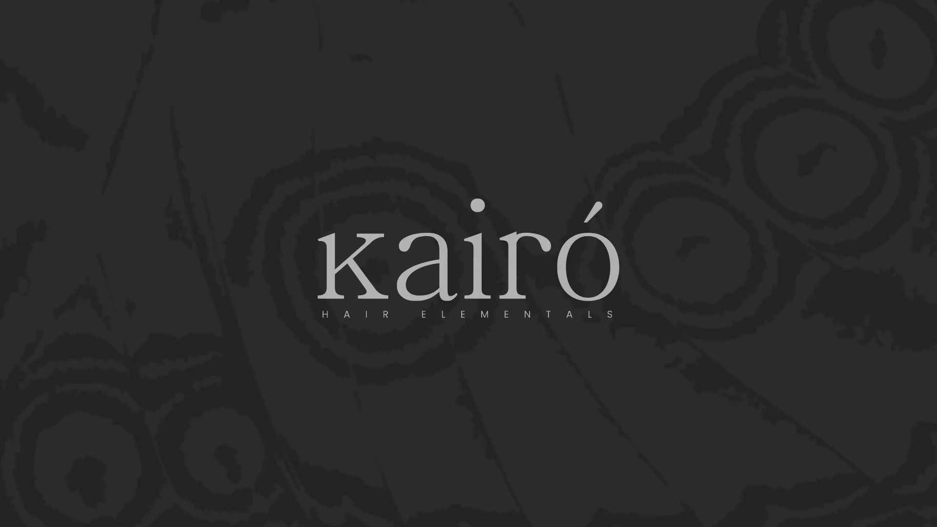Logotipo de Kairó en claro sobre fondo negro con el patrón de círculos de la marca