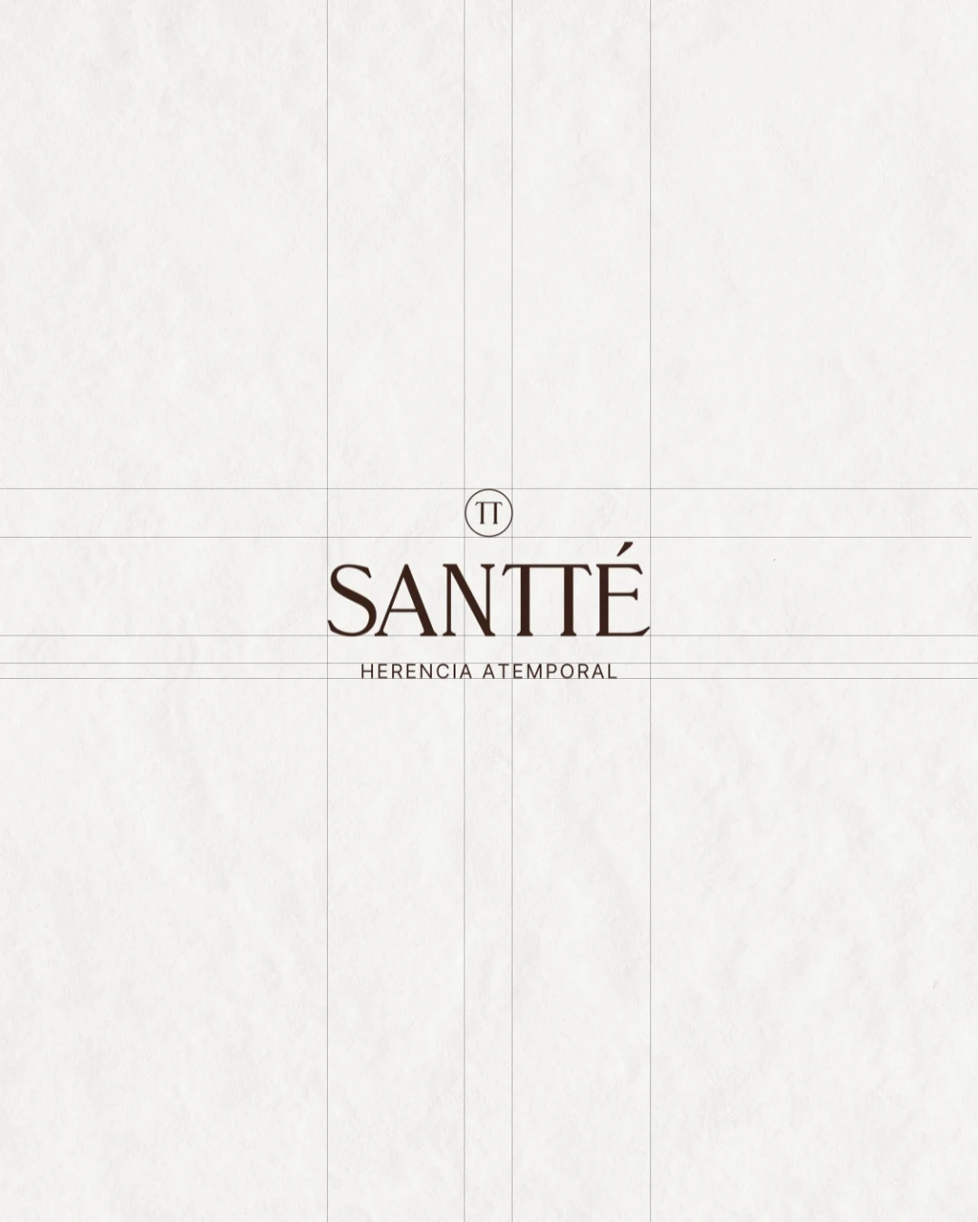 Logotipo de Santté grabado en seco sobre papel blanco texturado